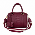 Bolso tipo Bowling  vinotinto 100% cuero